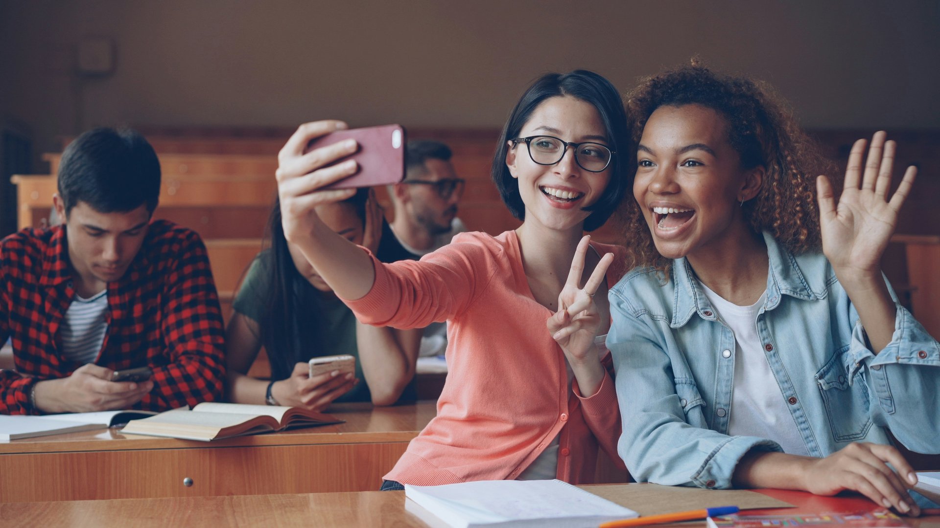 Students using phones and connecting